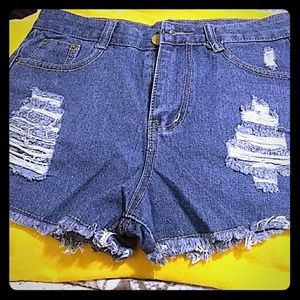 Ripped denim shorts